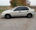 Белый Дэу Ланос, объемом двигателя 1.6 л и пробегом 310 тыс. км за 2300 $, фото 1 на Automoto.ua