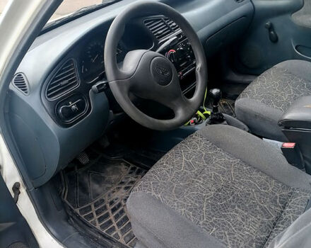 Белый Дэу Ланос, объемом двигателя 1.5 л и пробегом 240 тыс. км за 1900 $, фото 2 на Automoto.ua