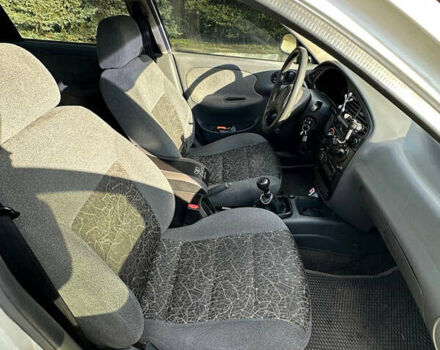 Белый Дэу Ланос, объемом двигателя 1.5 л и пробегом 268 тыс. км за 2300 $, фото 4 на Automoto.ua