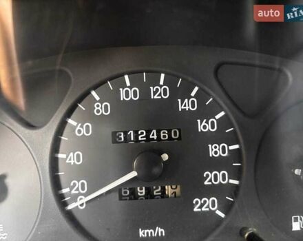 Белый Дэу Ланос, объемом двигателя 1.5 л и пробегом 350 тыс. км за 2422 $, фото 9 на Automoto.ua