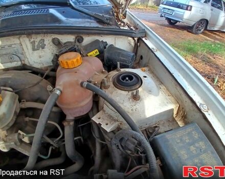 Білий Деу Ланос, об'ємом двигуна 1.4 л та пробігом 230 тис. км за 1250 $, фото 11 на Automoto.ua