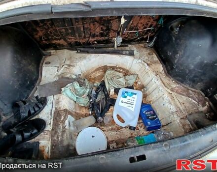 Білий Деу Ланос, об'ємом двигуна 1.4 л та пробігом 230 тис. км за 1250 $, фото 13 на Automoto.ua