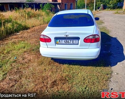 Белый Дэу Ланос, объемом двигателя 1.5 л и пробегом 242 тыс. км за 2500 $, фото 1 на Automoto.ua