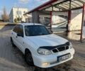 Білий Деу Ланос, об'ємом двигуна 1.5 л та пробігом 258 тис. км за 1399 $, фото 1 на Automoto.ua