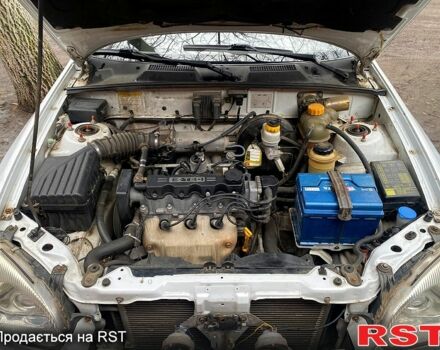 Білий Деу Ланос, об'ємом двигуна 1.5 л та пробігом 259 тис. км за 2400 $, фото 12 на Automoto.ua