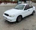Белый Дэу Ланос, объемом двигателя 1.5 л и пробегом 300 тыс. км за 1800 $, фото 1 на Automoto.ua