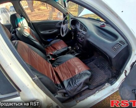 Білий Деу Ланос, об'ємом двигуна 1.4 л та пробігом 230 тис. км за 1250 $, фото 7 на Automoto.ua