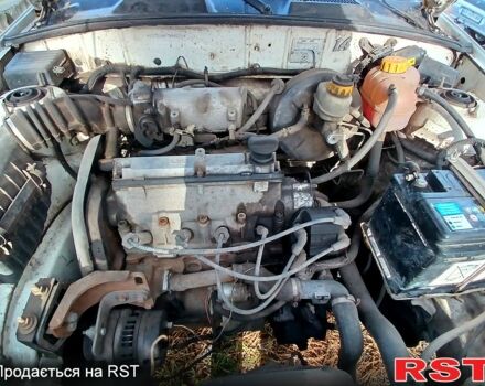 Білий Деу Ланос, об'ємом двигуна 1.4 л та пробігом 230 тис. км за 1250 $, фото 6 на Automoto.ua