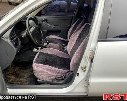 Білий Деу Ланос, об'ємом двигуна 1.5 л та пробігом 259 тис. км за 2400 $, фото 10 на Automoto.ua