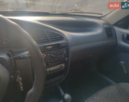 Белый Дэу Ланос, объемом двигателя 1.5 л и пробегом 155 тыс. км за 2999 $, фото 3 на Automoto.ua