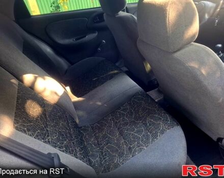 Белый Дэу Ланос, объемом двигателя 1.5 л и пробегом 225 тыс. км за 2000 $, фото 5 на Automoto.ua