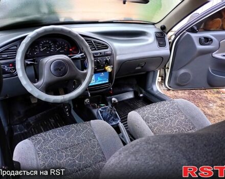 Белый Дэу Ланос, объемом двигателя 1.5 л и пробегом 230 тыс. км за 2750 $, фото 13 на Automoto.ua