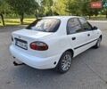 Белый Дэу Ланос, объемом двигателя 1.5 л и пробегом 223 тыс. км за 2950 $, фото 2 на Automoto.ua