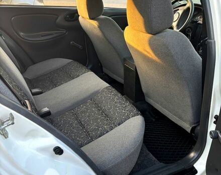 Белый Дэу Ланос, объемом двигателя 1.4 л и пробегом 150 тыс. км за 2000 $, фото 10 на Automoto.ua