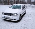 Белый Дэу Ланос, объемом двигателя 1.5 л и пробегом 240 тыс. км за 2000 $, фото 1 на Automoto.ua