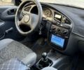 Белый Дэу Ланос, объемом двигателя 1.4 л и пробегом 780 тыс. км за 1950 $, фото 11 на Automoto.ua
