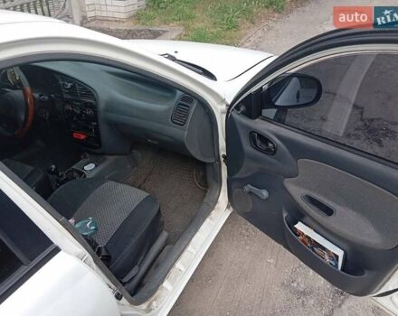 Білий Деу Ланос, об'ємом двигуна 1.39 л та пробігом 150 тис. км за 2000 $, фото 14 на Automoto.ua