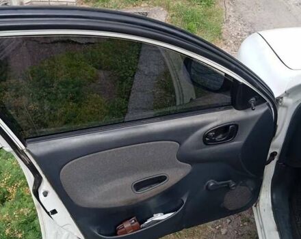 Білий Деу Ланос, об'ємом двигуна 1.39 л та пробігом 150 тис. км за 2000 $, фото 10 на Automoto.ua