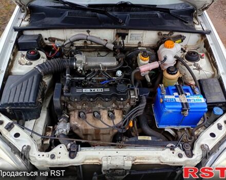 Белый Дэу Ланос, объемом двигателя 1.5 л и пробегом 230 тыс. км за 2750 $, фото 12 на Automoto.ua