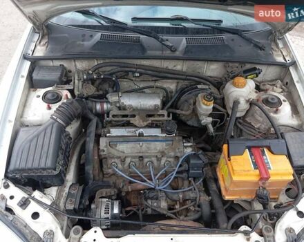 Білий Деу Ланос, об'ємом двигуна 1.39 л та пробігом 150 тис. км за 2000 $, фото 16 на Automoto.ua