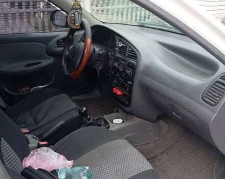 Білий Деу Ланос, об'ємом двигуна 1.39 л та пробігом 150 тис. км за 2000 $, фото 13 на Automoto.ua