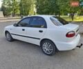 Белый Дэу Ланос, объемом двигателя 1.5 л и пробегом 223 тыс. км за 2950 $, фото 14 на Automoto.ua