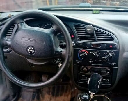 Белый Дэу Ланос, объемом двигателя 1.5 л и пробегом 150 тыс. км за 1400 $, фото 3 на Automoto.ua