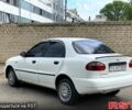 Белый Дэу Ланос, объемом двигателя 1.5 л и пробегом 300 тыс. км за 1550 $, фото 3 на Automoto.ua