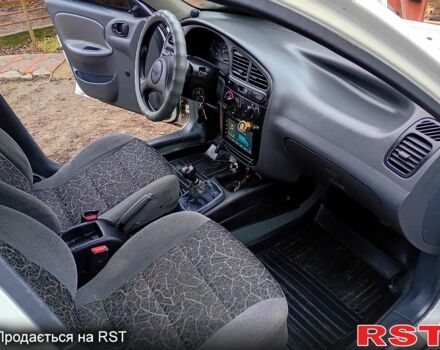 Белый Дэу Ланос, объемом двигателя 1.5 л и пробегом 230 тыс. км за 2750 $, фото 10 на Automoto.ua