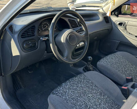 Білий Деу Ланос, об'ємом двигуна 1.5 л та пробігом 247 тис. км за 2999 $, фото 7 на Automoto.ua