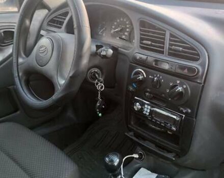 Белый Дэу Ланос, объемом двигателя 1.5 л и пробегом 160 тыс. км за 2250 $, фото 6 на Automoto.ua