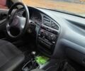 Белый Дэу Ланос, объемом двигателя 1.5 л и пробегом 230 тыс. км за 2000 $, фото 3 на Automoto.ua