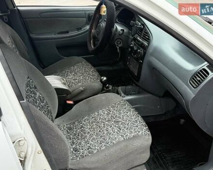 Білий Деу Ланос, об'ємом двигуна 1.5 л та пробігом 210 тис. км за 2350 $, фото 11 на Automoto.ua