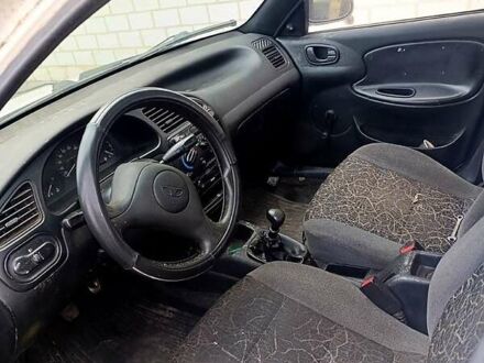 Белый Дэу Ланос, объемом двигателя 1.3 л и пробегом 80 тыс. км за 990 $, фото 1 на Automoto.ua