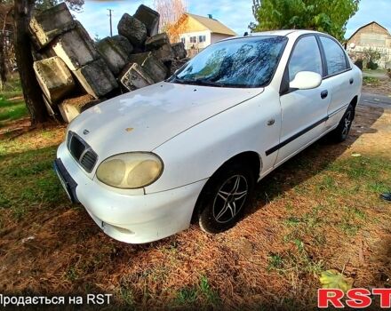 Білий Деу Ланос, об'ємом двигуна 1.4 л та пробігом 230 тис. км за 1250 $, фото 1 на Automoto.ua