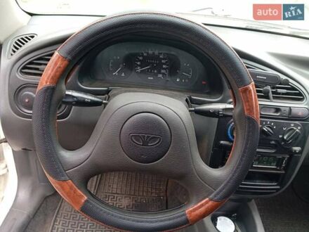 Білий Деу Ланос, об'ємом двигуна 1.39 л та пробігом 150 тис. км за 2000 $, фото 1 на Automoto.ua