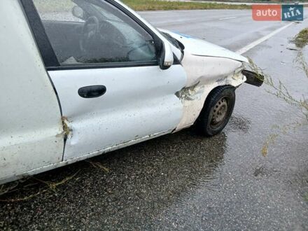 Білий Деу Ланос, об'ємом двигуна 1.6 л та пробігом 289 тис. км за 900 $, фото 1 на Automoto.ua