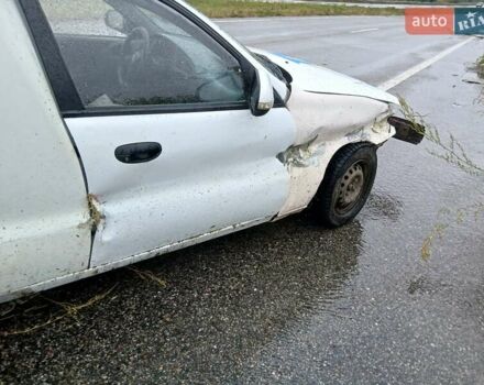 Белый Дэу Ланос, объемом двигателя 1.6 л и пробегом 289 тыс. км за 900 $, фото 1 на Automoto.ua