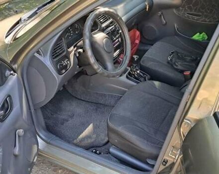 Бежевый Дэу Ланос, объемом двигателя 1.5 л и пробегом 115 тыс. км за 3900 $, фото 12 на Automoto.ua