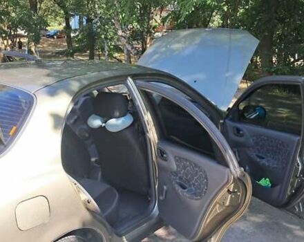 Бежевый Дэу Ланос, объемом двигателя 1.5 л и пробегом 115 тыс. км за 3900 $, фото 25 на Automoto.ua