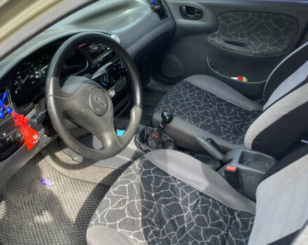 Бежевий Деу Ланос, об'ємом двигуна 1.5 л та пробігом 275 тис. км за 1600 $, фото 2 на Automoto.ua