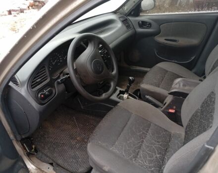 Бежевый Дэу Ланос, объемом двигателя 1.5 л и пробегом 300 тыс. км за 829 $, фото 4 на Automoto.ua