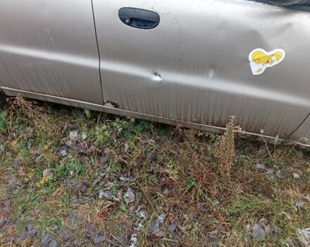 Бежевый Дэу Ланос, объемом двигателя 1.5 л и пробегом 300 тыс. км за 829 $, фото 3 на Automoto.ua