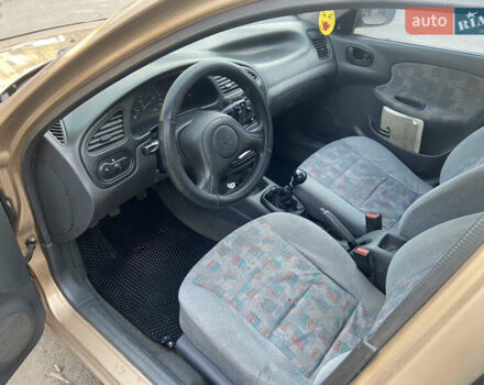 Бежевый Дэу Ланос, объемом двигателя 1.5 л и пробегом 380 тыс. км за 2500 $, фото 7 на Automoto.ua