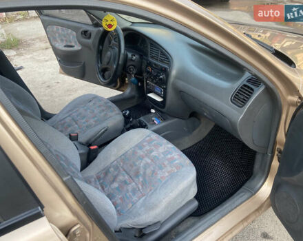 Бежевый Дэу Ланос, объемом двигателя 1.5 л и пробегом 380 тыс. км за 2500 $, фото 5 на Automoto.ua