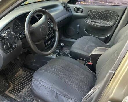 Бежевый Дэу Ланос, объемом двигателя 1.5 л и пробегом 260 тыс. км за 952 $, фото 13 на Automoto.ua