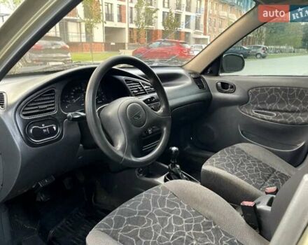 Бежевий Деу Ланос, об'ємом двигуна 1.5 л та пробігом 210 тис. км за 1450 $, фото 1 на Automoto.ua
