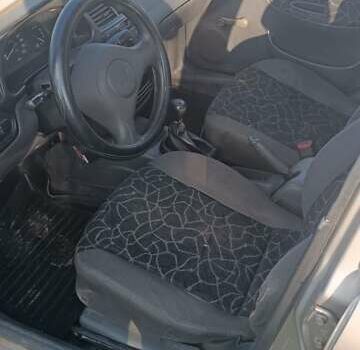 Бежевий Деу Ланос, об'ємом двигуна 1.5 л та пробігом 170 тис. км за 1999 $, фото 9 на Automoto.ua