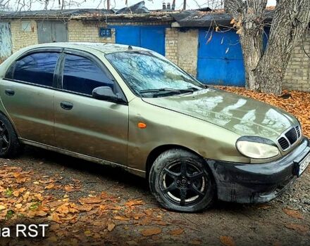 Бежевый Дэу Ланос, объемом двигателя 1.6 л и пробегом 353 тыс. км за 1000 $, фото 1 на Automoto.ua