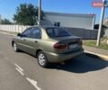 Бежевый Дэу Ланос, объемом двигателя 1.5 л и пробегом 251 тыс. км за 1899 $, фото 1 на Automoto.ua